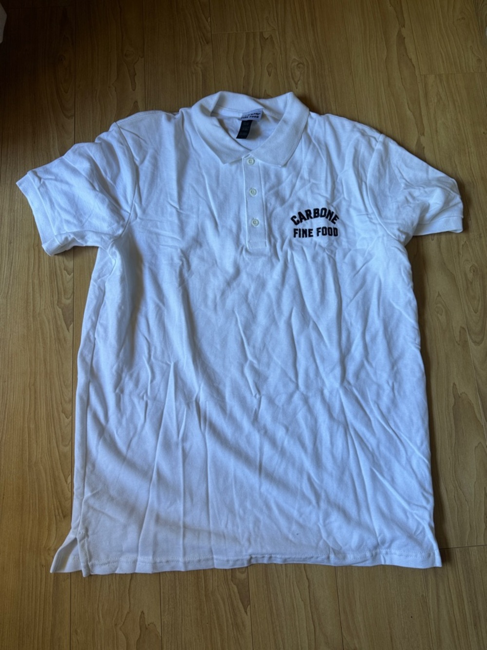 Carbone White Polo with Carbone Fine Food Chest